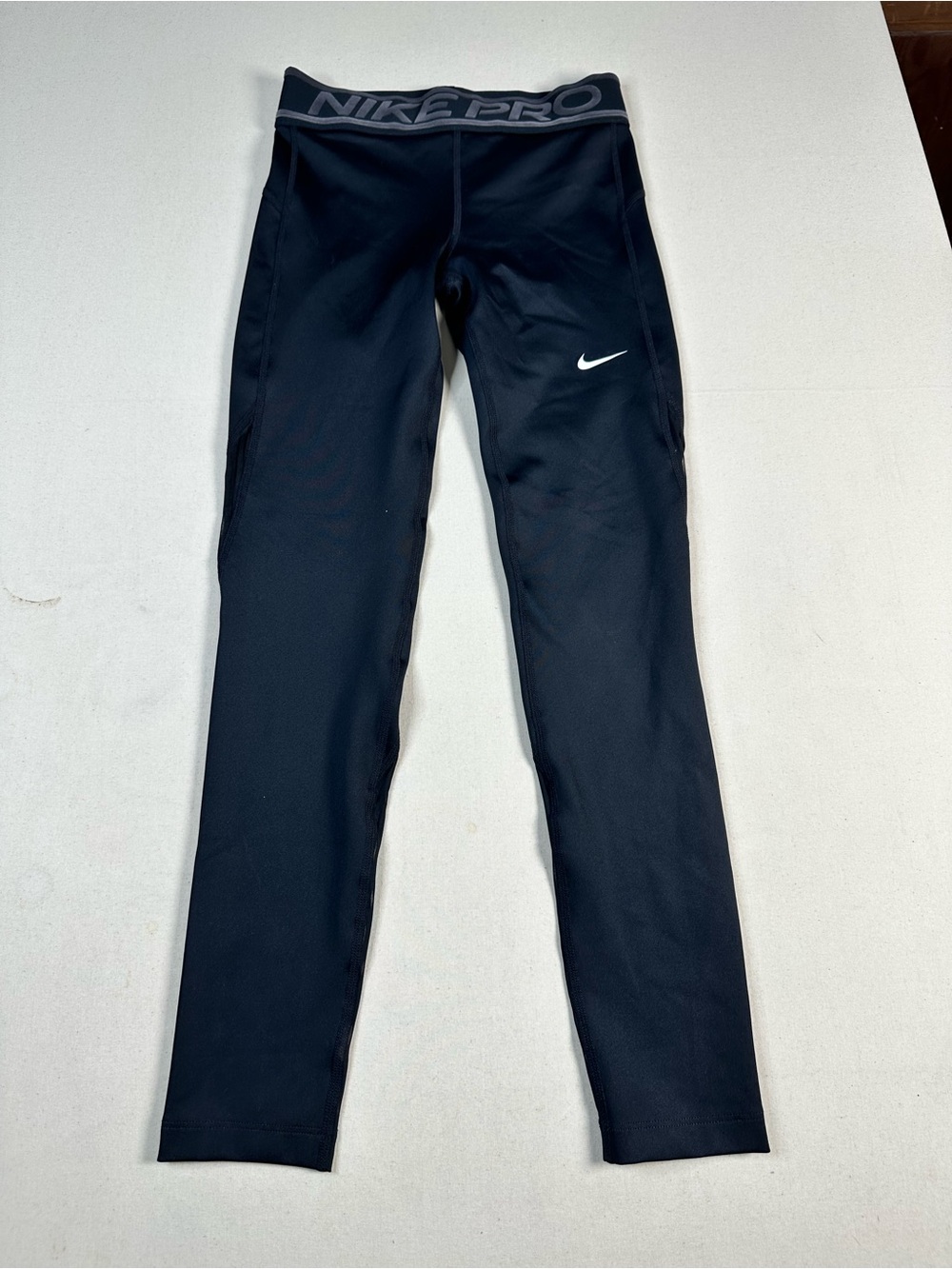 Nike Black Kids Pro Compression Leggings with White Swoosh medium